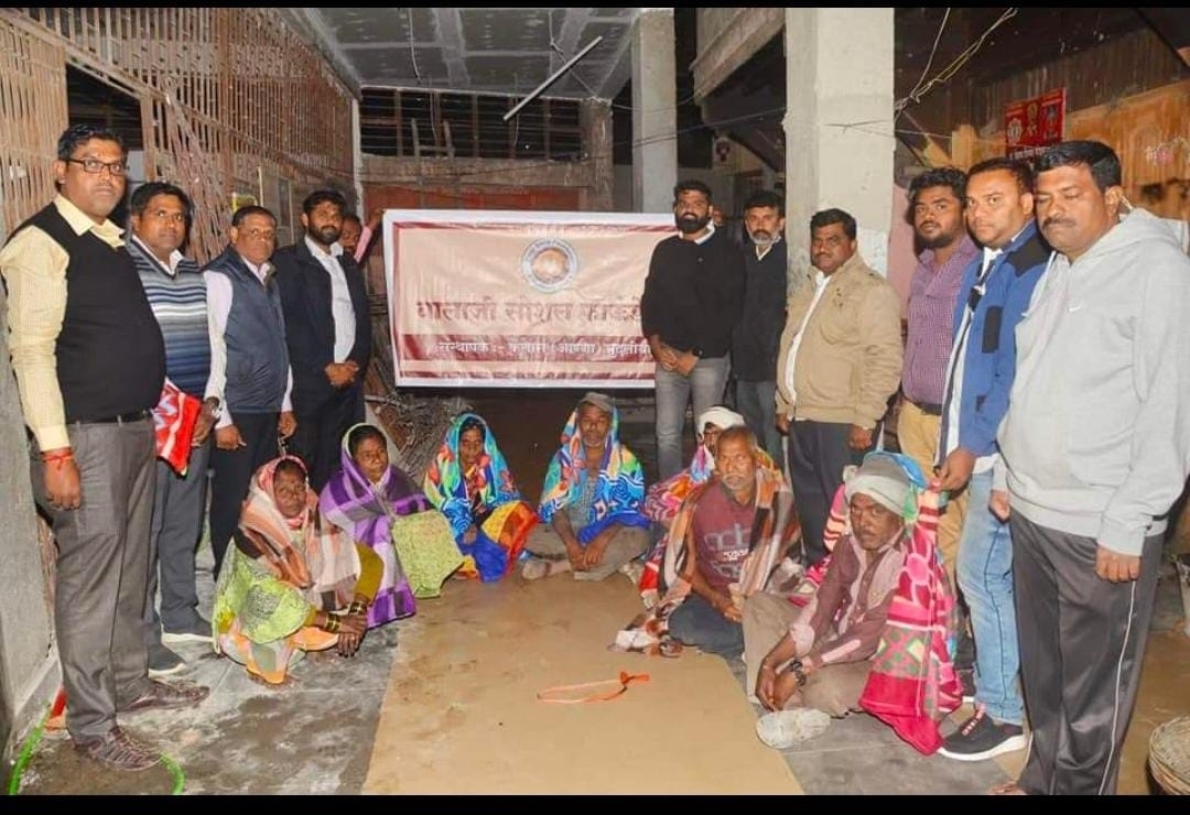 Blanket distribution for needy people at Nashik Road Railway Station during winter 2020